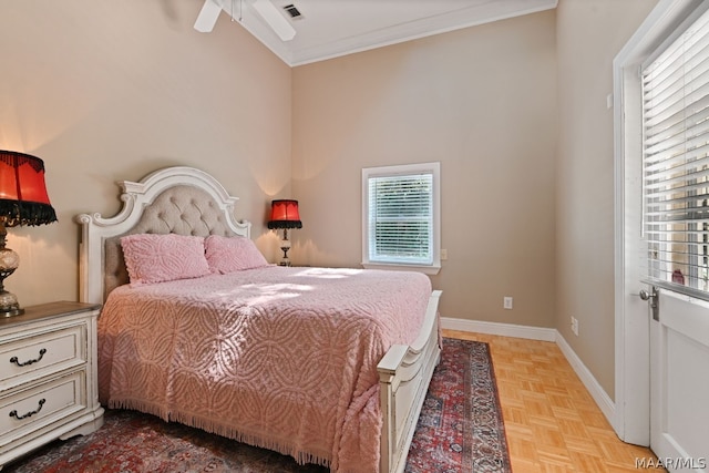 bedroom featuring ceiling fan, vaulted ceiling, ornamental molding, and light parquet floors