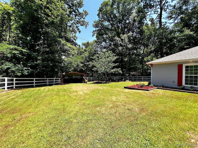 view of yard with fence