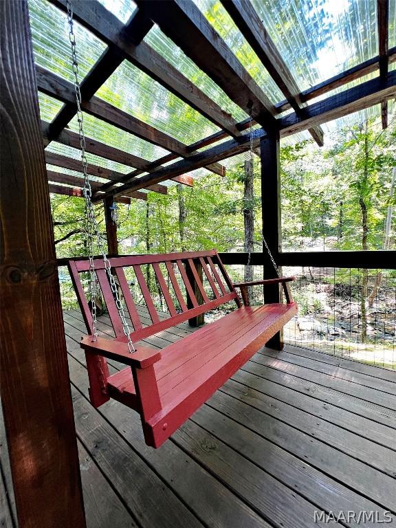 wooden deck with a pergola