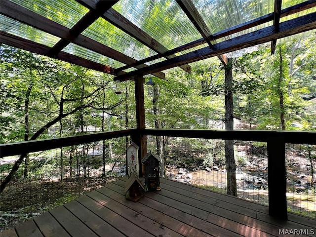 wooden terrace with a pergola