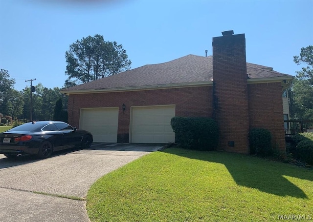 view of side of home featuring a lawn