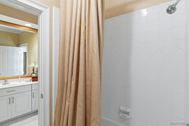 bathroom featuring shower / bath combination with curtain and vanity