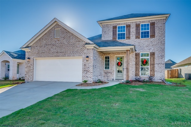 traditional home with brick siding, concrete driveway, an attached garage, central AC, and a front lawn