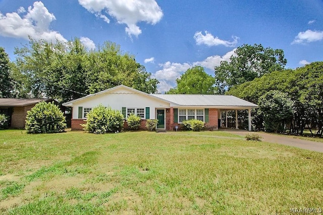 ranch-style home with a carport and a front lawn