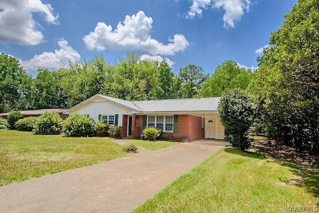 ranch-style house with a carport and a front lawn