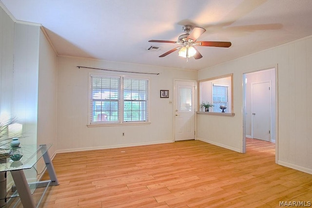 interior space with light hardwood / wood-style floors and ceiling fan