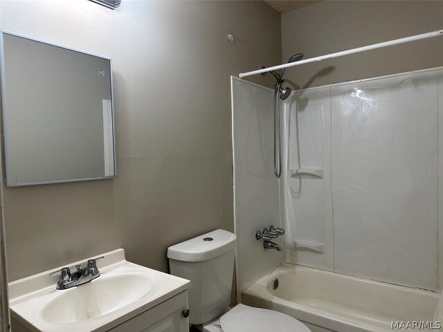 full bathroom featuring vanity, shower / bath combination, and toilet