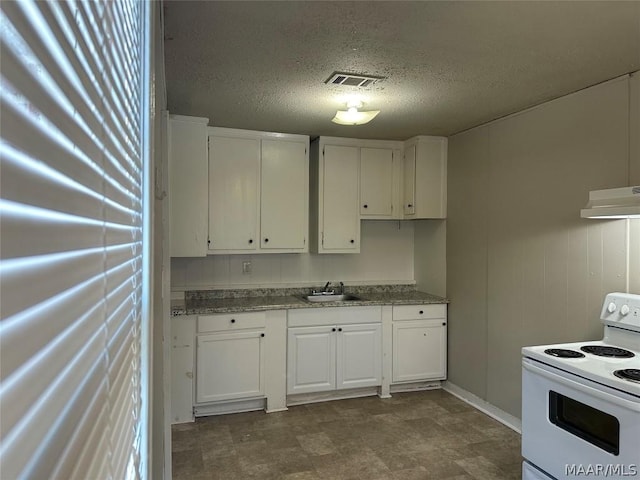 kitchen featuring a textured ceiling, white cabinets, white electric range oven, and range hood