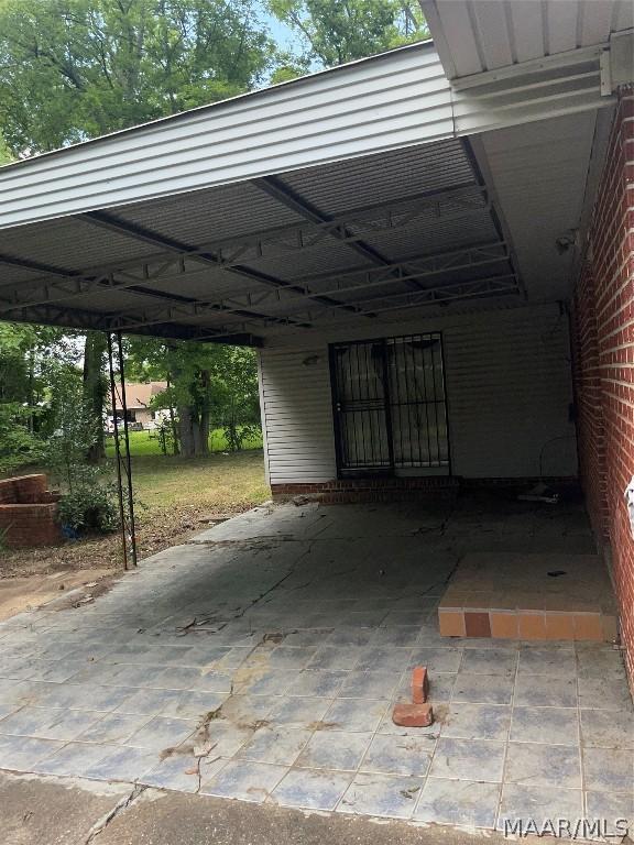 view of parking with a carport