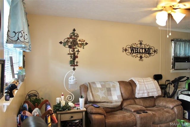 living room featuring ceiling fan