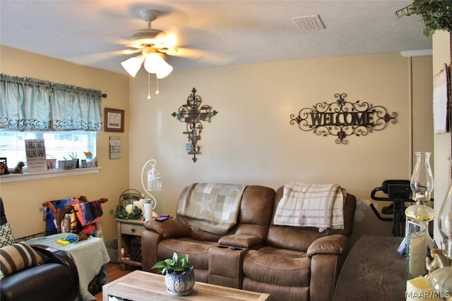 living room with ceiling fan