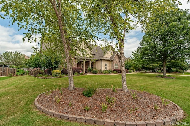 exterior space featuring a front yard