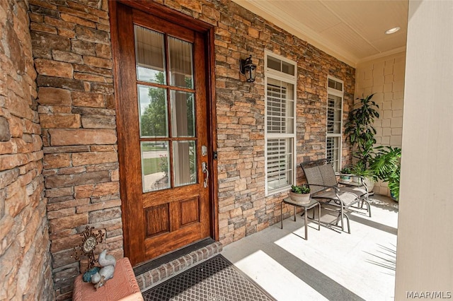 entrance to property with a porch