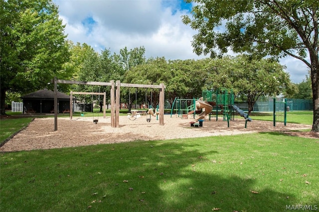 view of playground featuring a lawn