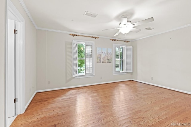 unfurnished room featuring crown molding, light hardwood / wood-style flooring, and ceiling fan