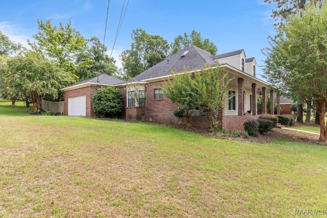 view of property exterior featuring a garage and a lawn