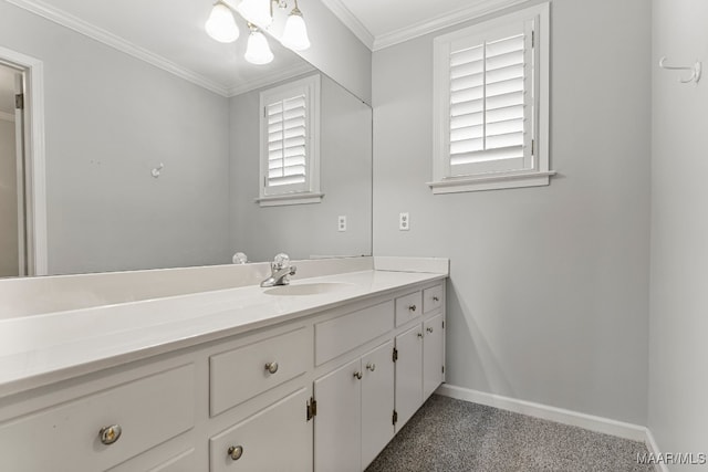 bathroom featuring vanity, a healthy amount of sunlight, and ornamental molding