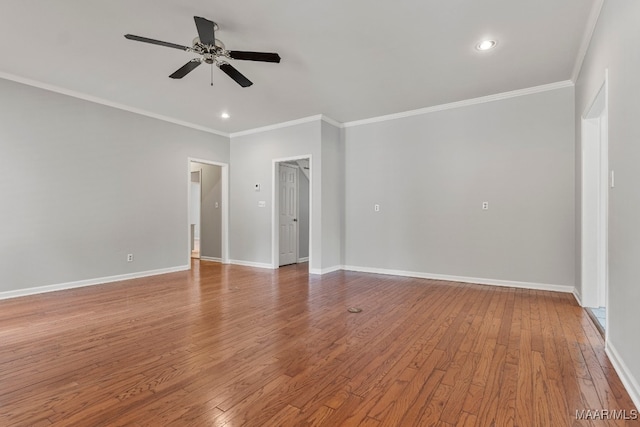 empty room with ceiling fan, ornamental molding, and hardwood / wood-style floors