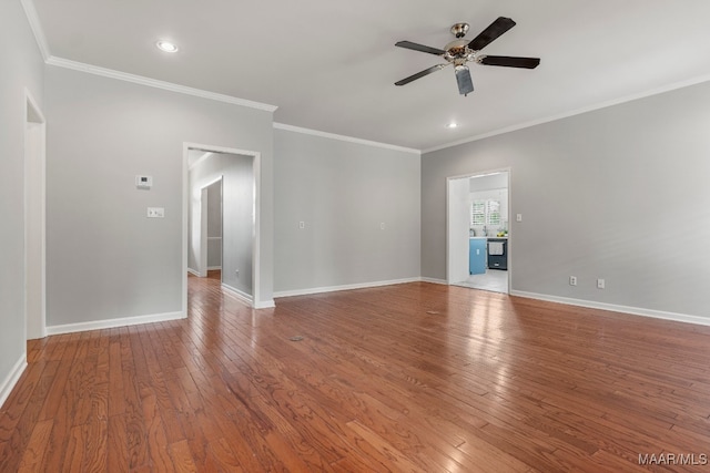 unfurnished room with ceiling fan, wood-type flooring, and ornamental molding