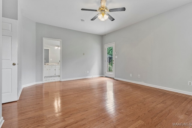 interior space with ceiling fan and light wood-type flooring