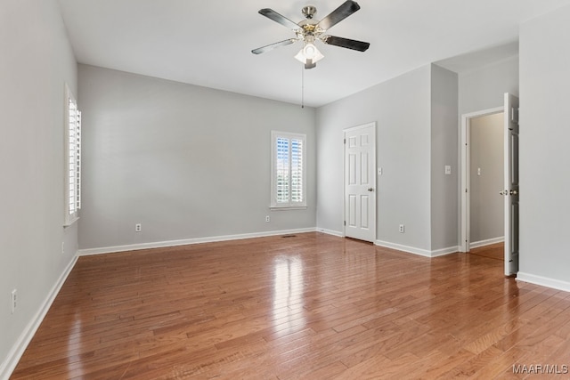 unfurnished bedroom featuring hardwood / wood-style floors and ceiling fan