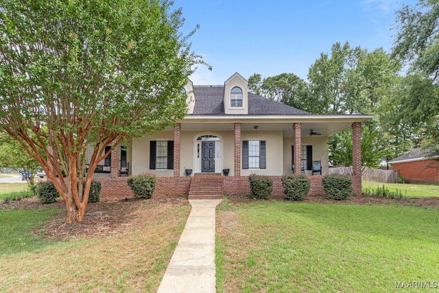 view of front facade featuring a porch and a front lawn