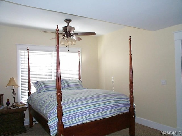 bedroom featuring carpet floors, ceiling fan, and baseboards