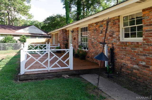 view of outbuilding with a lawn