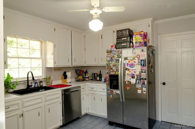 kitchen featuring a sink, light countertops, white cabinetry, and stainless steel appliances