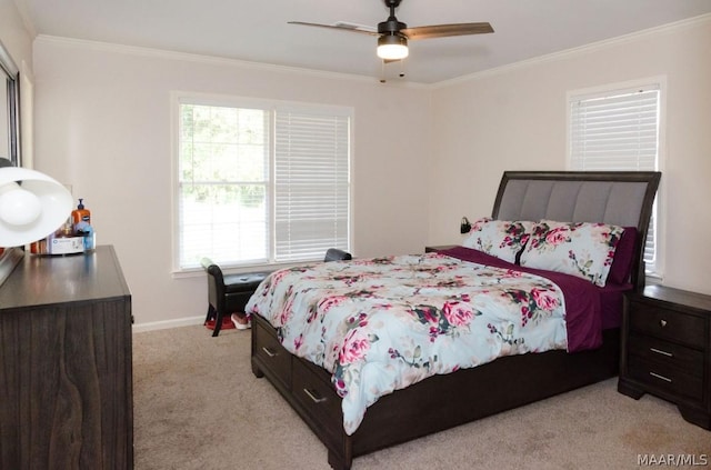 bedroom featuring ceiling fan, light carpet, baseboards, and ornamental molding