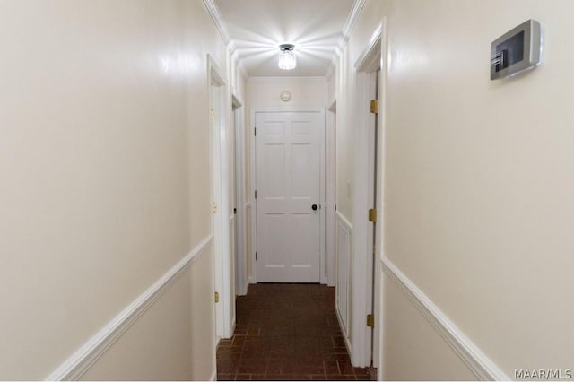 corridor featuring crown molding