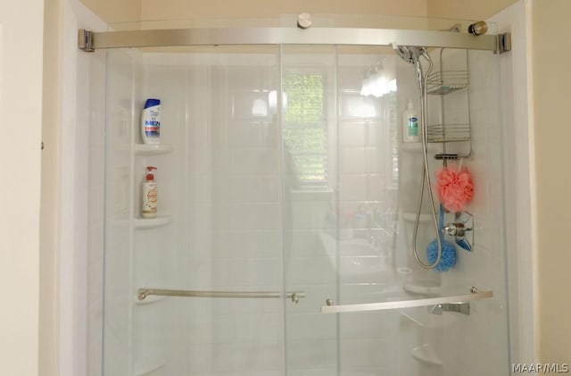 bathroom featuring a stall shower