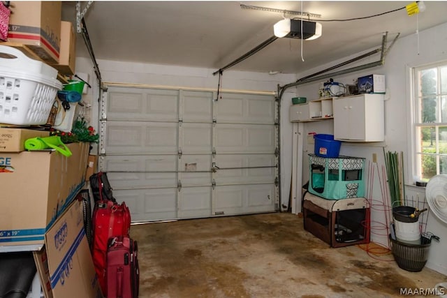 garage featuring a garage door opener