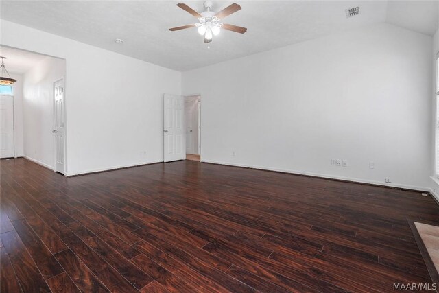 spare room featuring dark hardwood / wood-style floors and ceiling fan