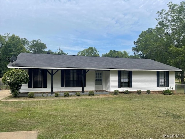 ranch-style house with a front lawn