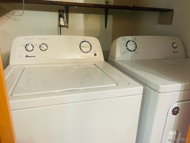 laundry area with washer and dryer