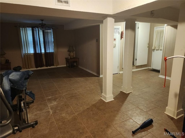 709 N Marable Dr, Tuskegee, AL 36083 - finished basement featuring visible vents, baseboards, dark tile patterned flooring, and a ceiling fan