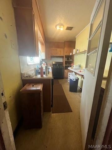 kitchen with visible vents and light countertops