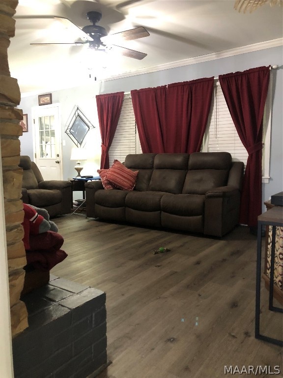 living room featuring crown molding, ceiling fan, and hardwood / wood-style floors