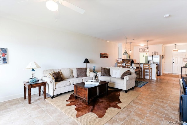 living room with ceiling fan