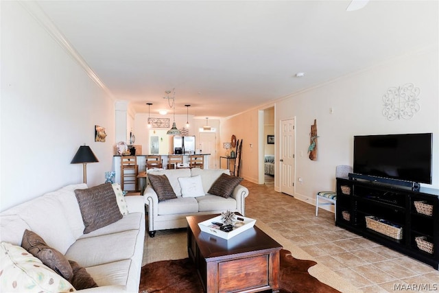 living room with ornamental molding