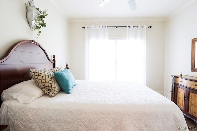 bedroom featuring ceiling fan and ornamental molding