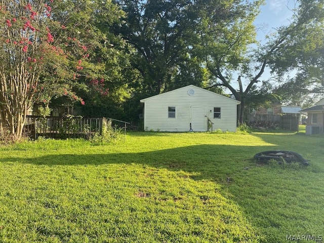 view of yard with a wooden deck