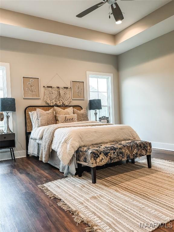 1379 Barret Park Way, Montgomery, AL 36117 - bedroom with dark wood-style flooring, multiple windows, baseboards, and ceiling fan
