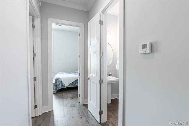 corridor with light hardwood / wood-style flooring