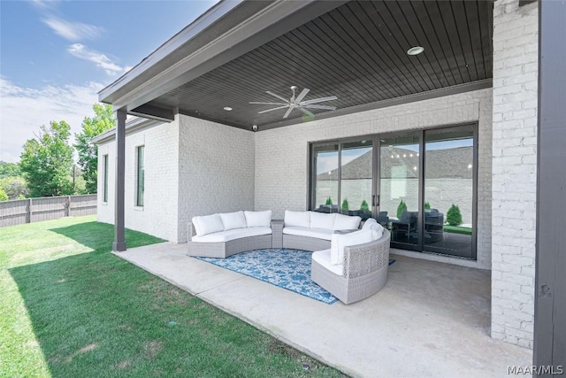 view of patio with an outdoor living space and ceiling fan