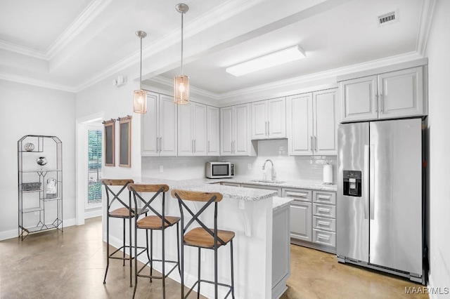 1426 Barret Park Way, Montgomery, AL 36117 - kitchen featuring stainless steel appliances, a kitchen bar, decorative light fixtures, light stone countertops, and tasteful backsplash
