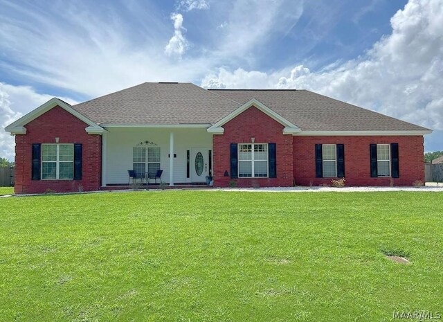 ranch-style home with a front yard