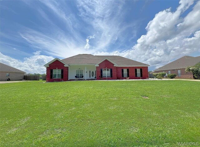 ranch-style house with a front yard