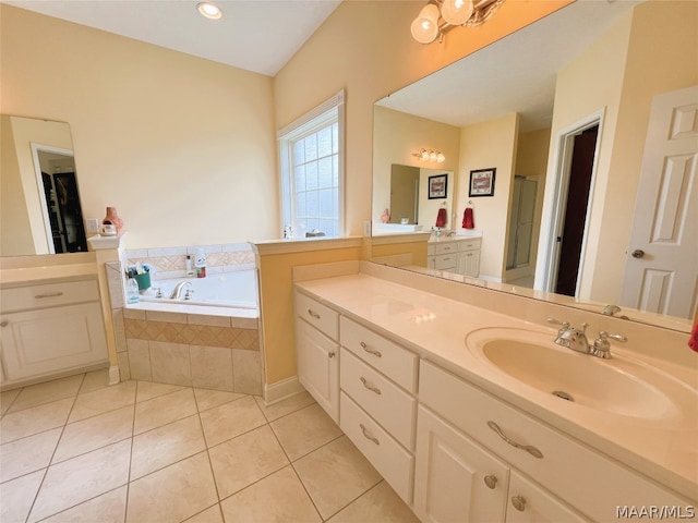 bathroom with vanity, tile patterned floors, and independent shower and bath